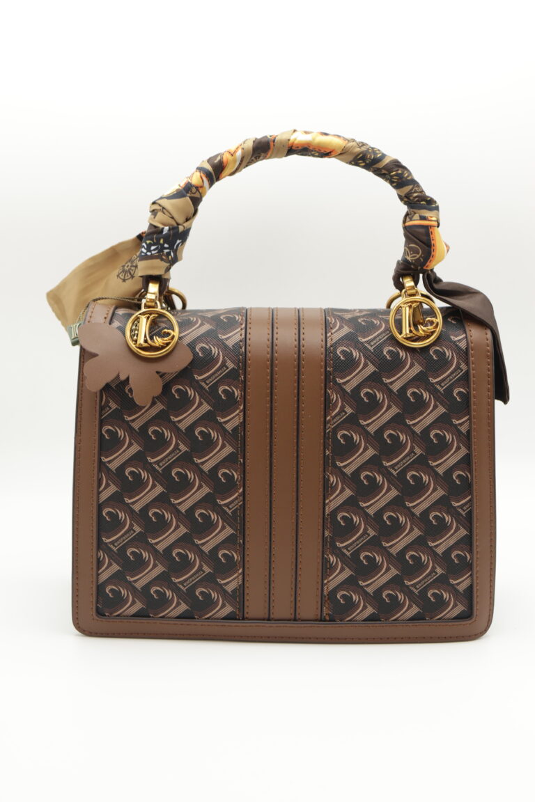 Image 4 of 5 — back view of the Chocolate Butterfly Luxe Bag showing the full monogram panel, vertical tan leather stripes and stitched leather binding
